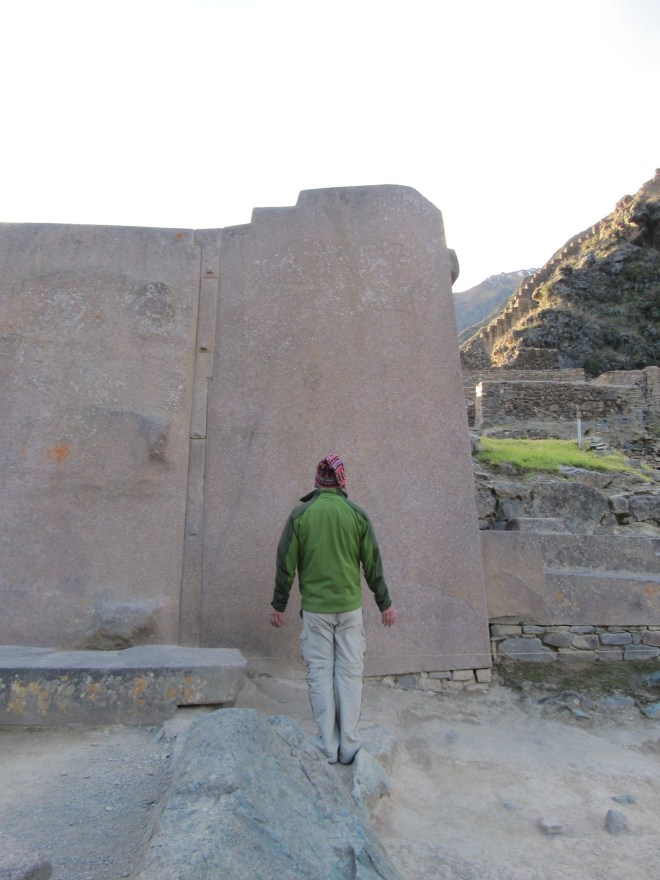 A visitor to Ollantaytambo, in the Sacred Valley of Peru, absorbing the energy there