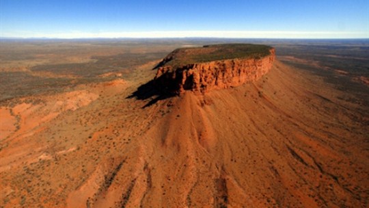 In the 'Wind' episode professor Stewart stands on the top of Mt Conner, and important Aboriginal sacred site, to view the surrounding sand-dunes. Source: sss.travelnt.com