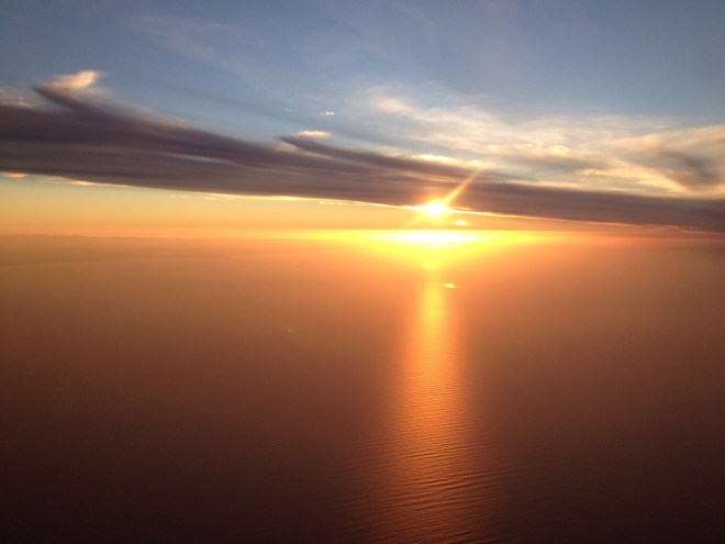 Flying into northern Tasmania can provide some magical moments of the sun setting on Bass Strait.
